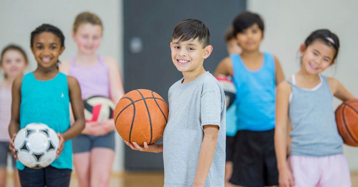 children playing sports as part of extracurricular activities