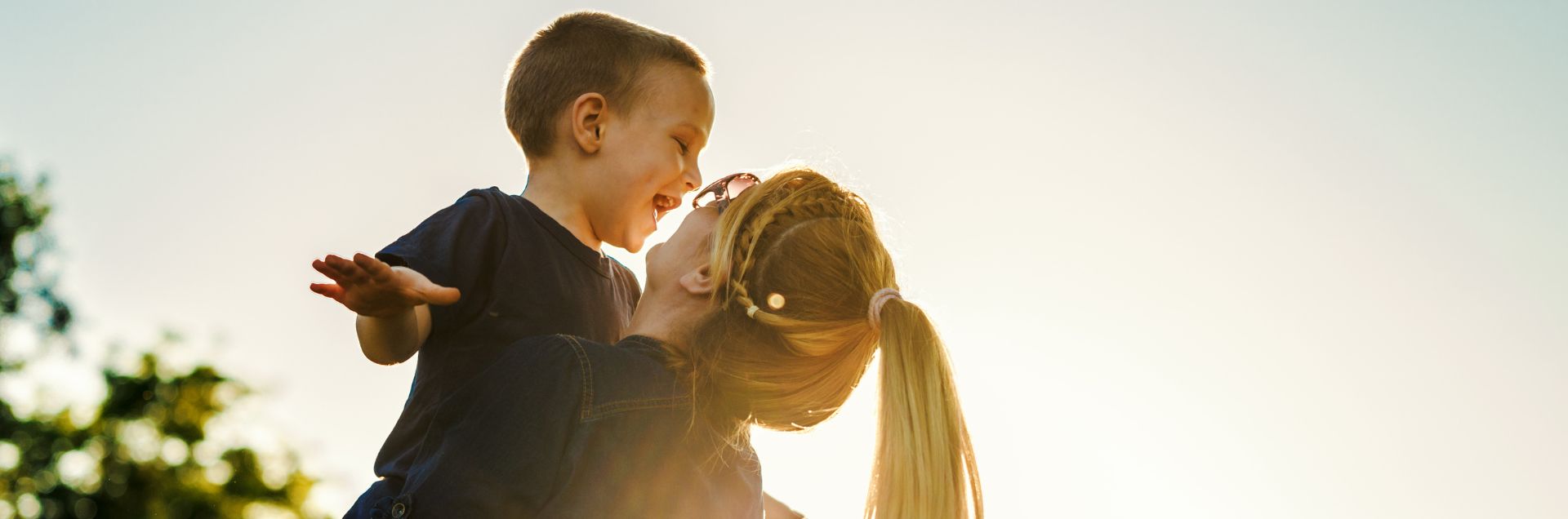 mother and young son playing outside