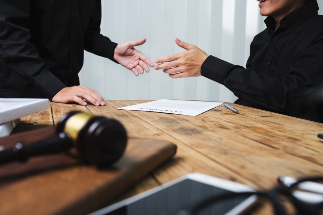 lawyer and client discussing missing court